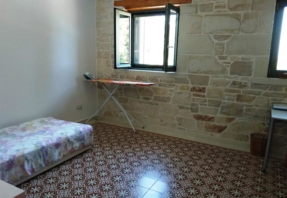 Luxury-stone-house-for-sale-in-Douliana-Apokoronas-Chania-Crete-bedroom-with-retro-tiles-202e9652